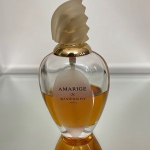 Amarige Eau de Toilette by Givenchy: Approx 1.5 Ounces In A 3 Ounce Bottle